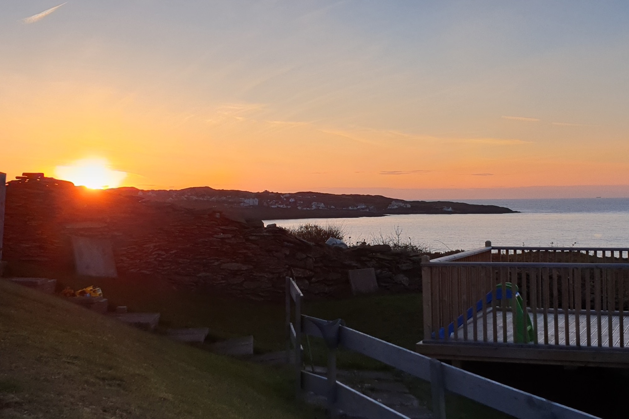 Sunset over the Anglesey coast near Gwendon Holiday Home